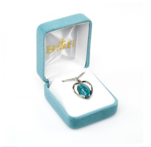 Load image into Gallery viewer, Blessed Mother Mary with rays coming out of her extended hands, crushing a serpent under her feet.