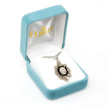 Load image into Gallery viewer, Blessed Mother Mary with rays coming out of her extended hands, crushing a serpent under her feet.